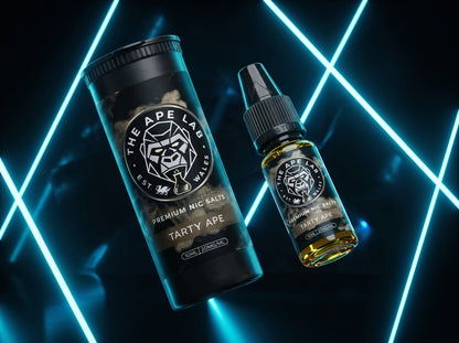 A bottle of Tarty Ape Premium Nic Salts e-liquid and its matching black cylindrical packaging container, both featuring the 'The Ape Lab' logo, set against a dark background with glowing blue neon lines.
